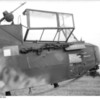 XX_German_DFS_230_glider_with_a_MG_34_machine_gun_mounted_on_top_of_the_aircraft_and_another_stowed_next_to_the_cockpit,_Italy,_1943__note_Hs_126_aircraft_in_background