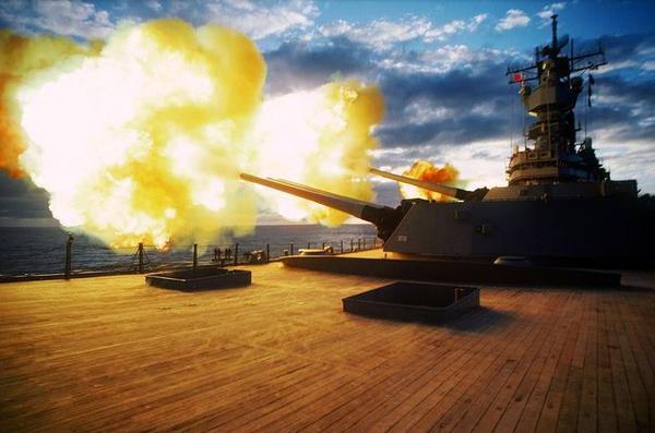 USS Iowa [BB-61) Fires its 16 inch Guns 