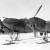 An uncommon sight of a P-38 J with skis in place of the wheels.