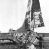 B-17 of the 100th Bomber Squadron of the USAAF rests in an English airfield after being severely damaged by flack over Frankfurt. She was eventually repaired and returned to normal duty, 1944