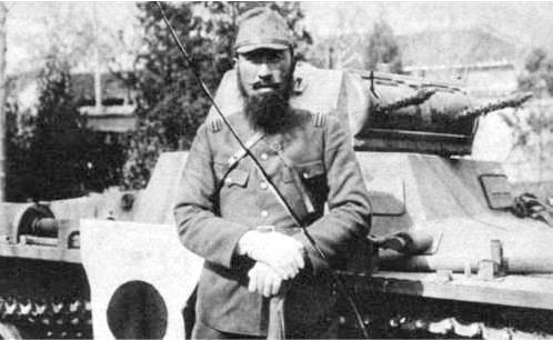 Japanese officer poses with a captured Chinese Pz I tank in Nanjing, 1938