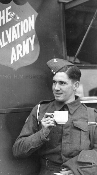 Soldier with a cup of coffee provided by the Salvation Army WW2