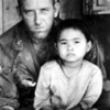 US soldier with a South Vietnamese child, Vietnam