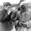 Salvation Army worker writing for wounded soldier. France, 1918