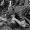 A medic attempts to save the life of a fellow medic wounded at Hamburger Hill. May 19, 1969. The wounded medic later died