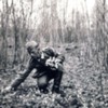 German soldier picking flowers