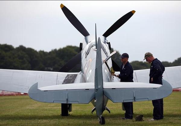 An aircraft is cleaned