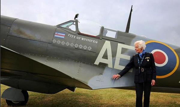 Former second world war transport pilot Mary Ellis looks at a Spitfire of the type she delivered during the war at commemorations marking the 75th anniversary of the Hardest Day of the battle of Britain 